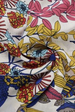 Viskose Fashion - growing flowers and trees blue/yellow/coral on White