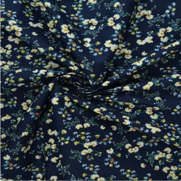 Baumwolle - Small Soft yellow flowers and branches on navy