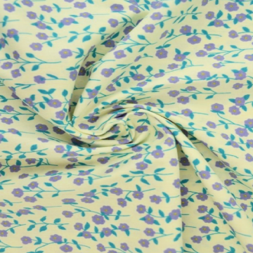 Baumwolle - Petite Lavender Flowers on Soft Yellow