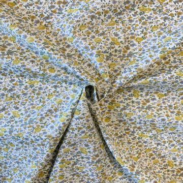 Baumwolle - Golden and Tiny Blue Flowers on White